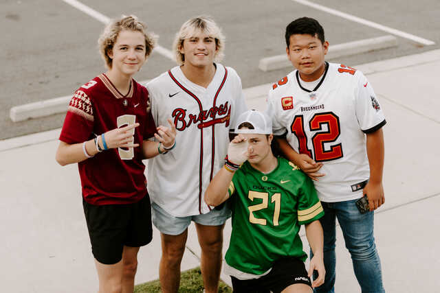 high school boys wearing jerseys