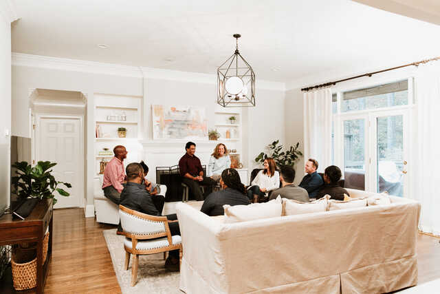 community group meeting in a living room