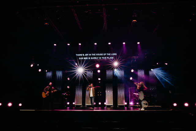 Worship team on stage for Sunday services. 